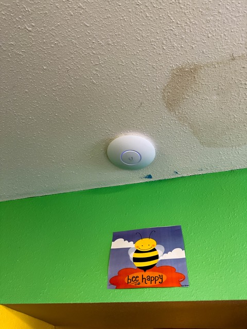Ceiling access point in a classroom