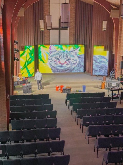 Church sanctuary with stage and video screens