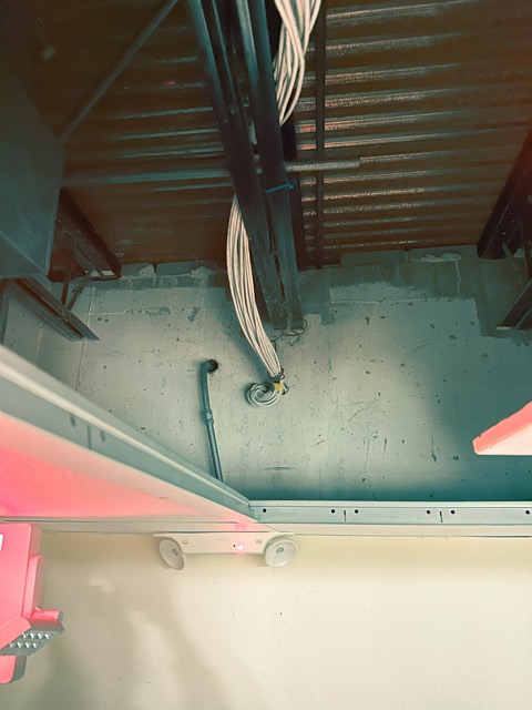 Conduit through the basement ceiling