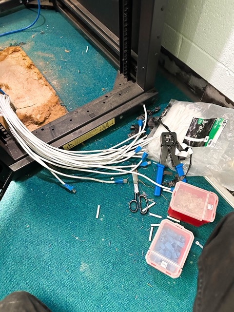 Bundle of new cable runs being terminated