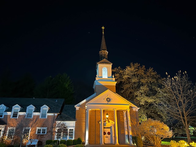 Church exterior lit at night