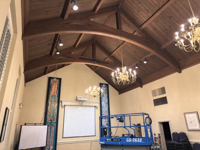 Fellowship hall with screen and lift during install