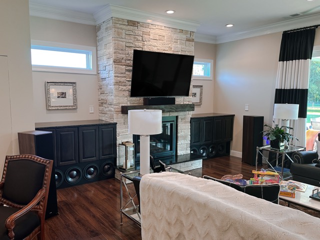 Living room with fireplace TV