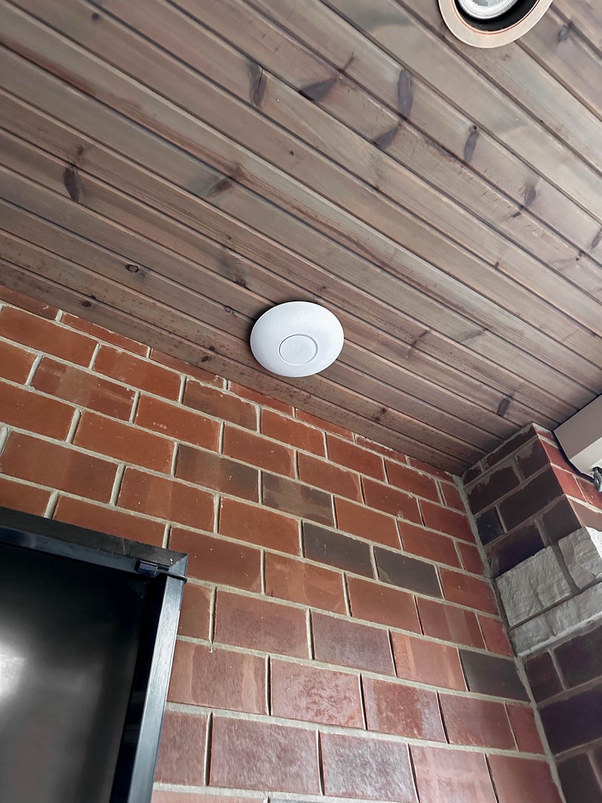 Ceiling access point on a wood plank ceiling