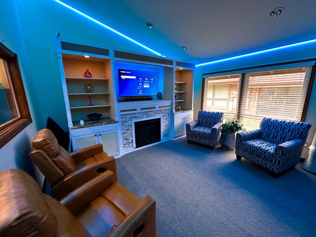 Media room lit in cool blue