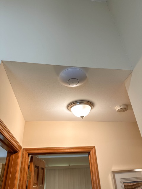 Ceiling access point in the hallway