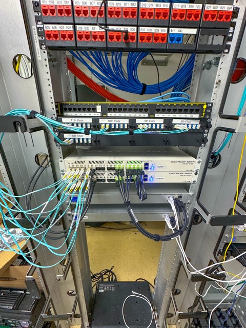 Two-post rack with patch panels