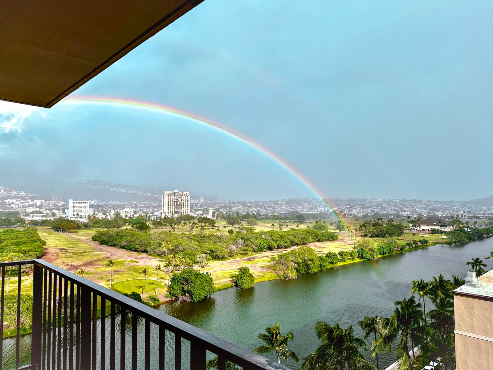 Rainbow over the city from the balcony