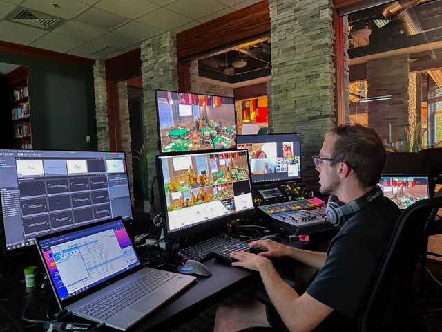 Operator at a multi-monitor video switching station