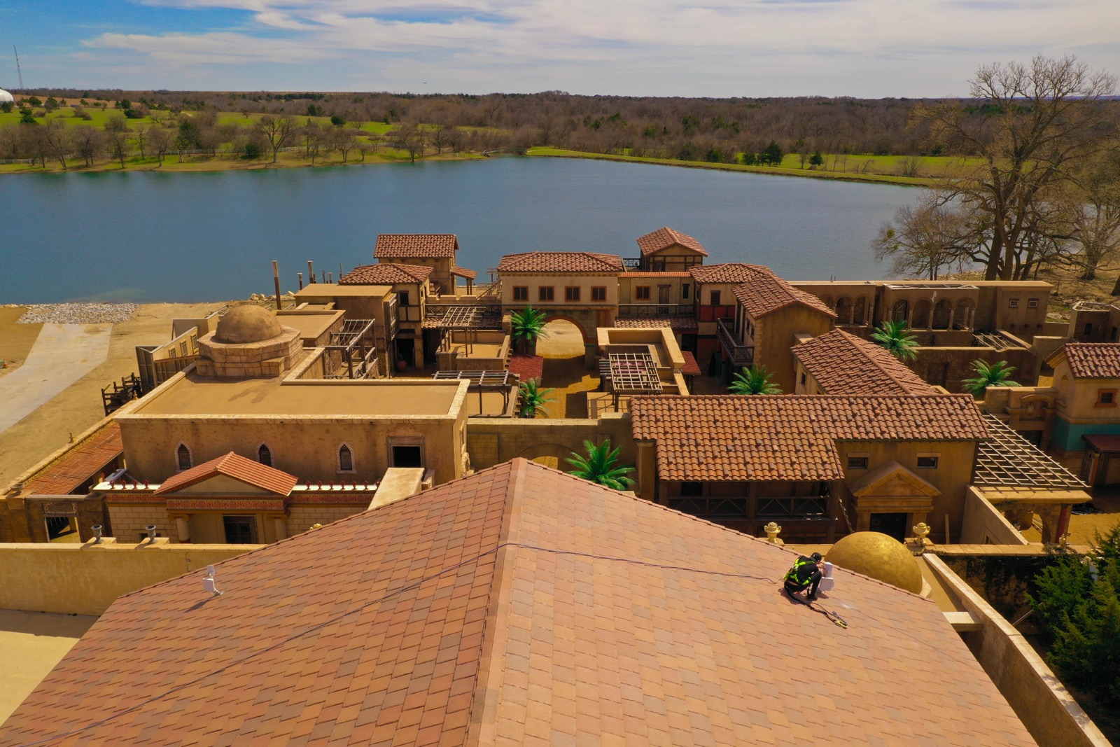Aerial view of the film backlot beside the lake