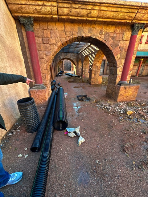 Conduit run through a set archway