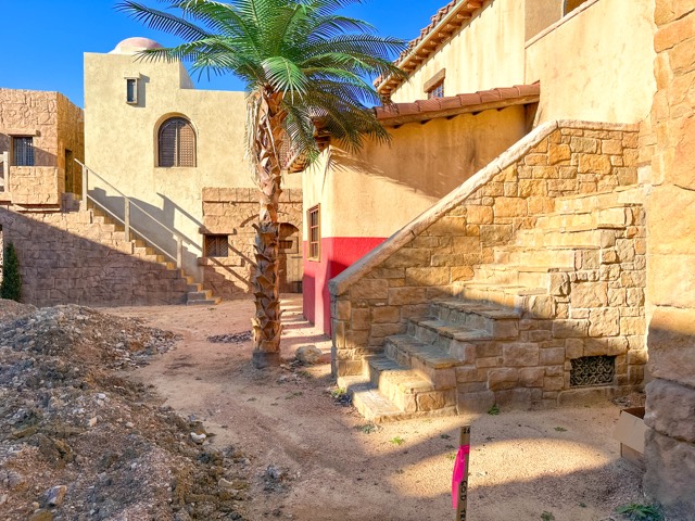 Stone stairs and facades along the set street