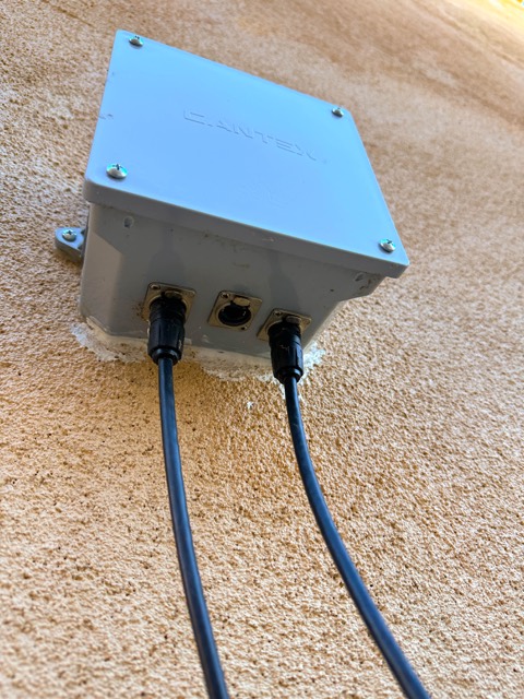 Weatherproof junction box with conduit fittings