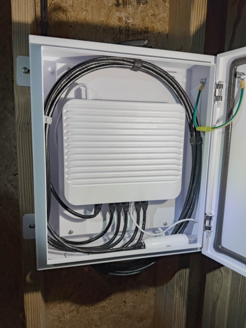 Enclosure opened to show the outdoor network hardware