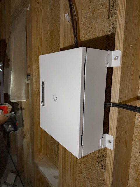 Sealed enclosure mounted inside a set doorway