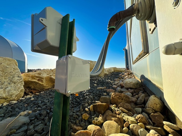 Exterior conduit run along a building wall
