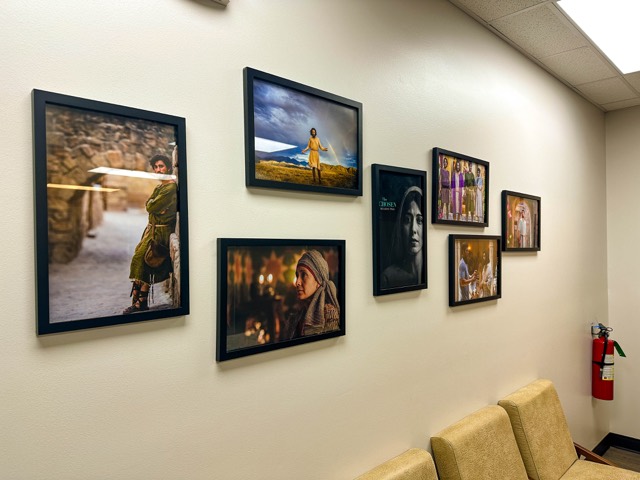 Office hallway with framed artwork