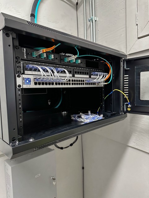 Wall cabinet with switch in a production office