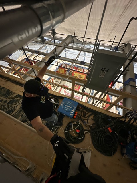Running cable up the stage wall