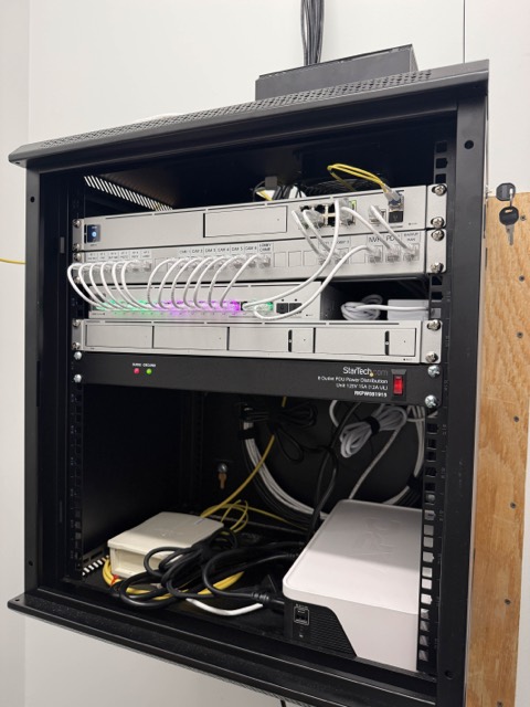 Cabinet interior with labeled cabling