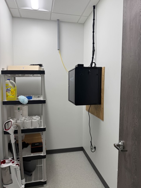 Network cabinet in the warehouse storage closet