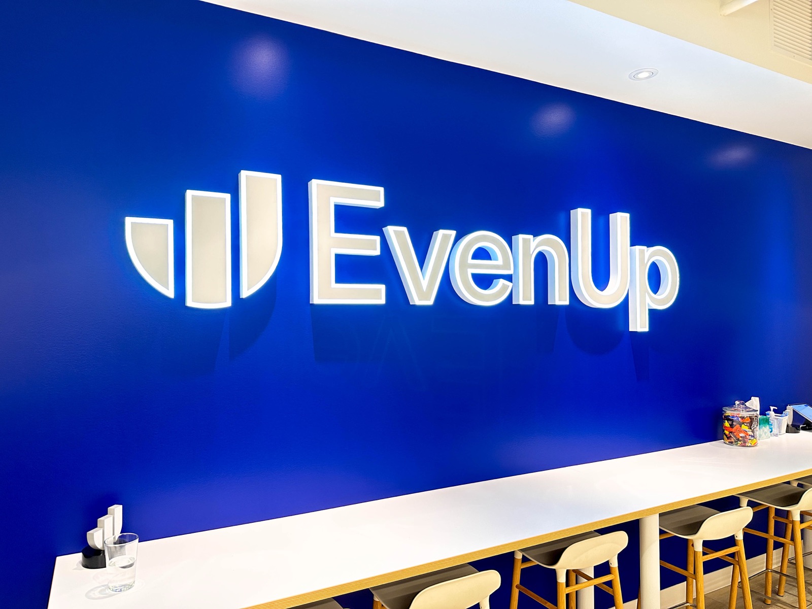 Lobby wall with the company logo